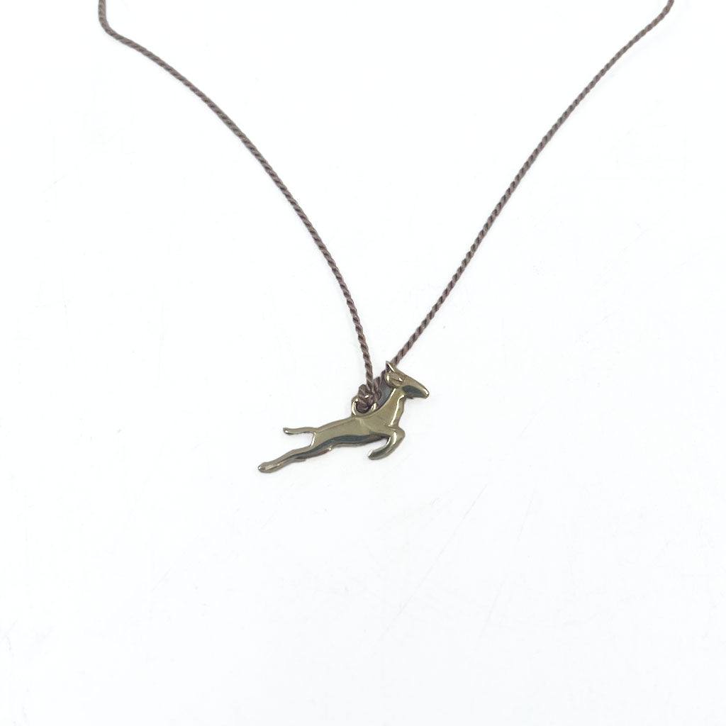 NECKLACE GOLD SPRINGBUCK ON BEIGE SILK – NIKKI'S The Gift Shop