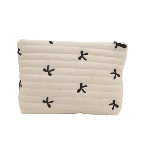 COSMETIC BAG QUILTED CREAM WITH BLACK EMBIODERED BOWS
