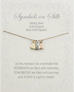 NECKLACE TRIPLE HEART ON  GREY SILK